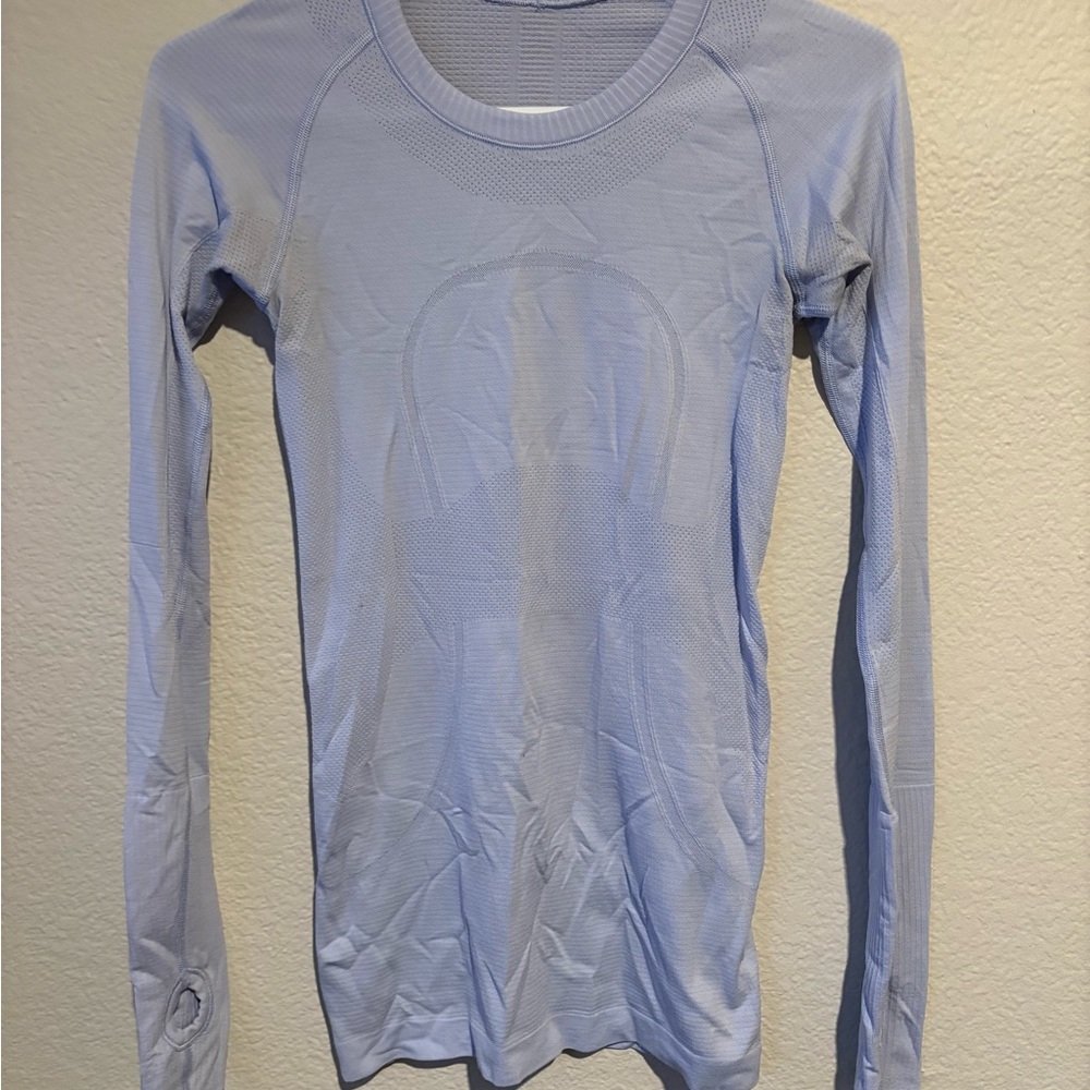 Swiftly Tech Long-Sleeve Shirt - Hip Length 
Light purple/lavender
